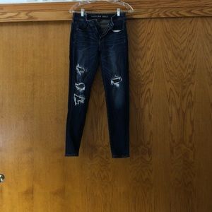 American Eagle ripped dark wash skinny jeans.